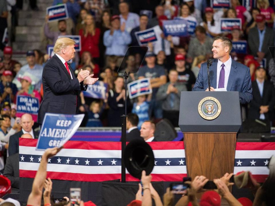 Kansas Attorney General Kris Kobach appeared with former President Donald Trump during a 2018 rally in Topeka.