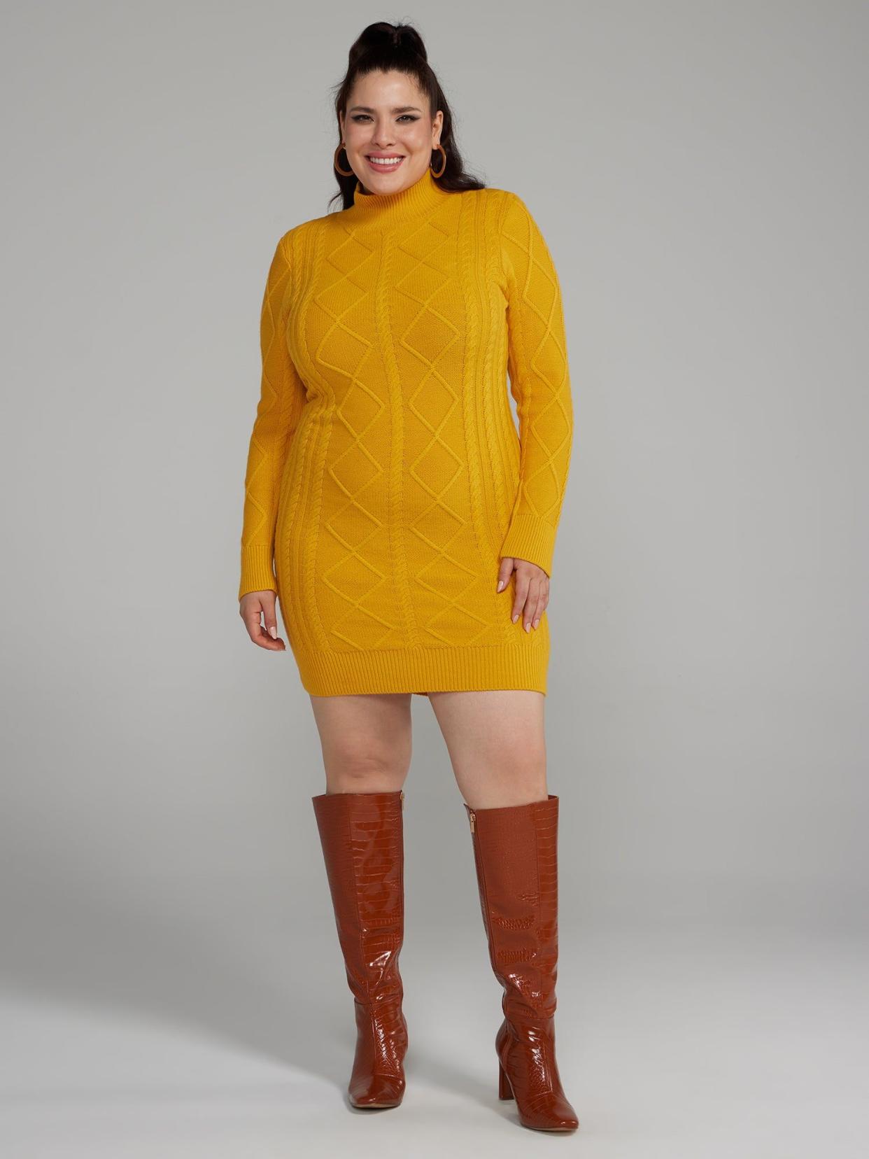 <p><a href="https://www.fashiontofigure.com/products/plus-size-back-cutout-cable-knit-sweater-dress" rel="nofollow noopener" target="_blank" data-ylk="slk:Shop Now;elm:context_link;itc:0;sec:content-canvas" class="link rapid-noclick-resp">Shop Now</a></p> <p>Back Cutout Cable Knit Sweater Dress</p> <p>fashiontofigure.com</p> <p>$14.39</p>