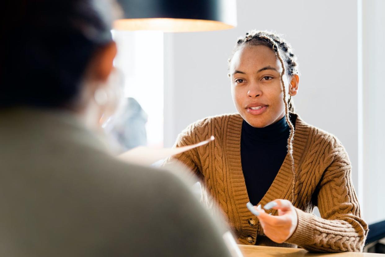 U.S. women earn 82% of what U.S. men earn — and the gap is significantly higher for Black and Hispanic women. <a href="https://www.gettyimages.com/detail/photo/young-female-applicant-at-job-interview-royalty-free-image/1355656345" rel="nofollow noopener" target="_blank" data-ylk="slk:Portra/E+ Collection/Getty Images;elm:context_link;itc:0;sec:content-canvas" class="link ">Portra/E+ Collection/Getty Images</a>