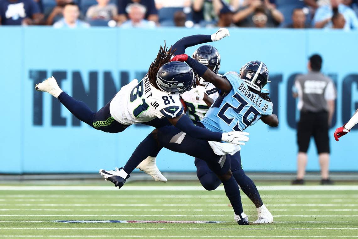 Seahawks wide receiver and kick returner Laviska Shenault (81) blocks Tennessee Titans cornerback Jarvis Brownlee Jr. (29) on a kickoff in the first quarter of the team’s NFL preseason game at Nissan Stadium. Casey Gower/USA Today Network/USA TODAY NETWORK