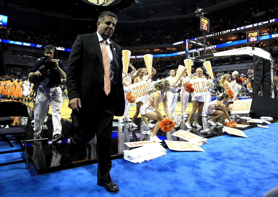 CHARLOTTE, NC - MARCH 18: Head coach Bruce Pearl of the Tennessee Volunteers walks off the court after the Volunteers were defeated 75-45 by the Michigan Wolverines during the second round of the 2011 NCAA men's basketball tournament at Time Warner Cable Arena on March 18, 2011 in Charlotte, North Carolina. (Photo by Streeter Lecka/Getty Images)