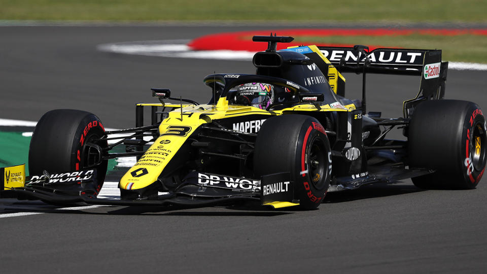 Daniel Ricciardo is pictured at the wheel of his Renault F1 car.