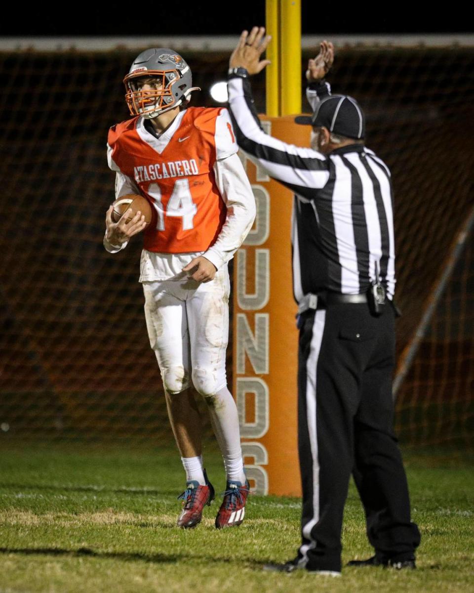 Mason Degnan scores for the Greyhounds in Atascadero 41-13 loss to Washington Union in the CIF Central Section Division 3 playoffs on Nov. 9, 2023.