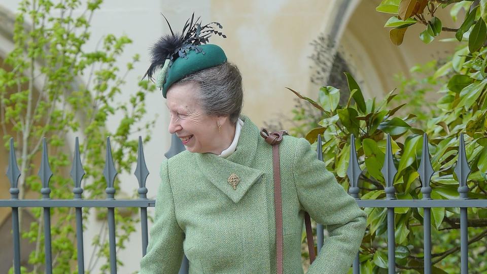 Princess Anne in a lovely green coat and fringed boots