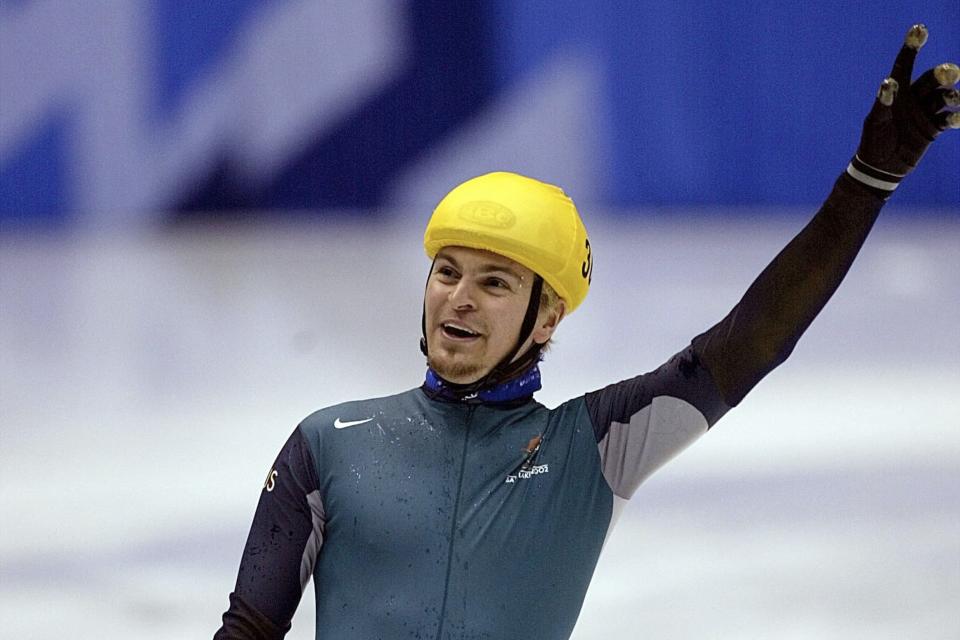 FILE - Steven Bradbury of Australia crosses the finish line to win the men's 1,000-meter short-track speed skating race at the Winter Olympics in Salt Lake City, Utah, Saturday, Feb. 16, 2002. Bradbury has been presented with a bravery award by the Queensland state governor in Brisbane for rescuing four teenagers from rough seas at a beach at Caloundra north of Brisbane in March of last year. (AP Photo/Lionel Cironneau, File)
