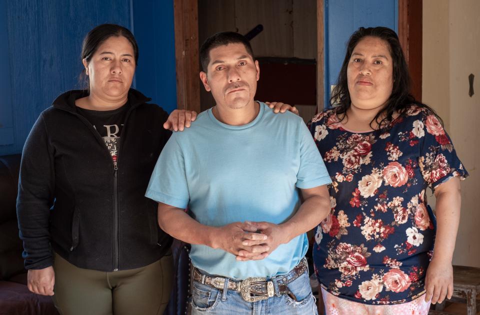 Soledad Hernandez in a black hoodie, Gabino Ramos Hernandez in a blue T-shirt, and Soledad Ramos Hernandez in a flowered blouse.