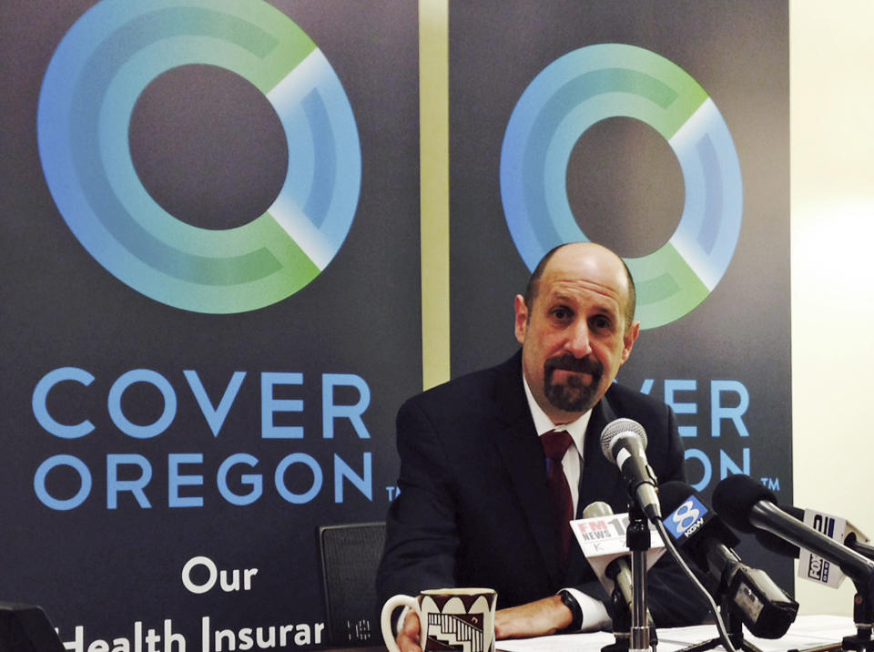 FILE - This Dec. 10, 2013, file photo shows Cover Oregon Executive Director Dr. Bruce Goldberg at a news conference at Cover Oregon headquarters in Durham, Ore. With the open enrollment deadline approaching, some states running their own health insurance exchanges are focused less on getting robust sign-ups than on avoiding total disaster. Nevada, Massachusetts, Vermont, Maryland and Oregon are among the states facing severe technical and administrative problems, which have led to firings of top officials and contract cancellations for key software companies.(AP Photo/Gosia Wozniacka, File)