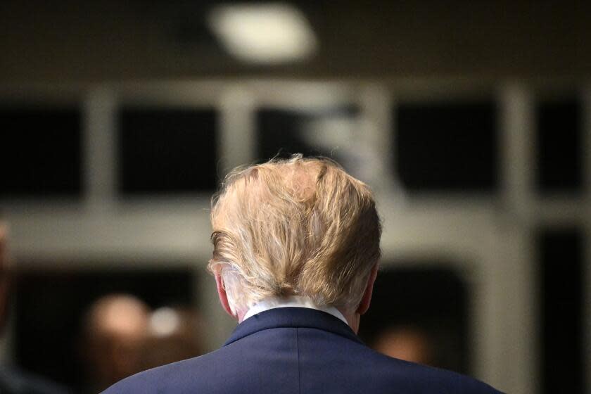 TOPSHOT - Former US President Donald Trump walks to the courtroom after speaking to the press at Manhattan Criminal Court in New York City on February 15, 2024. Trump is in court ahead of a trial for illegally covering up hush money payments made to hide extramarital affairs, including with porn star Stormy Daniels. The hearing will see Trump's legal team attempt to have the case thrown out. (Photo by ANGELA WEISS / AFP) (Photo by ANGELA WEISS/AFP via Getty Images)