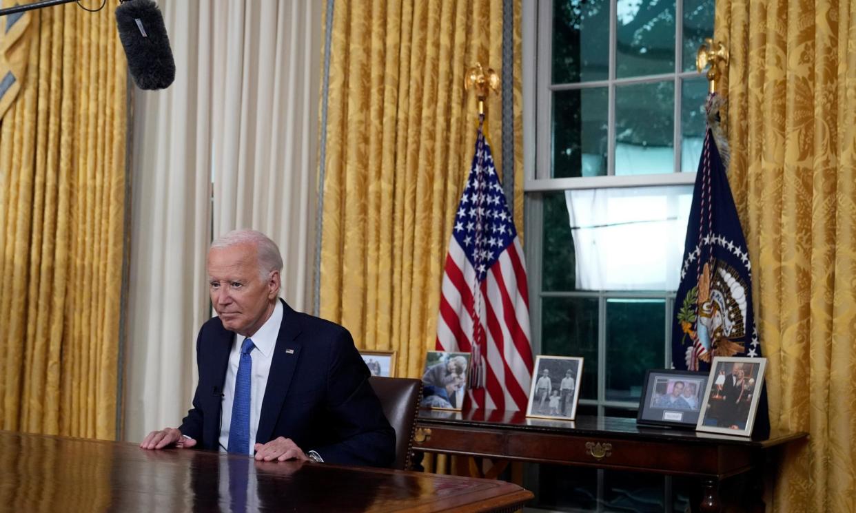 <span>Joe Biden concludes his address to the nation from the Oval Office of the White House in Washington, on 24 July 2024.</span><span>Photograph: Getty Images</span>