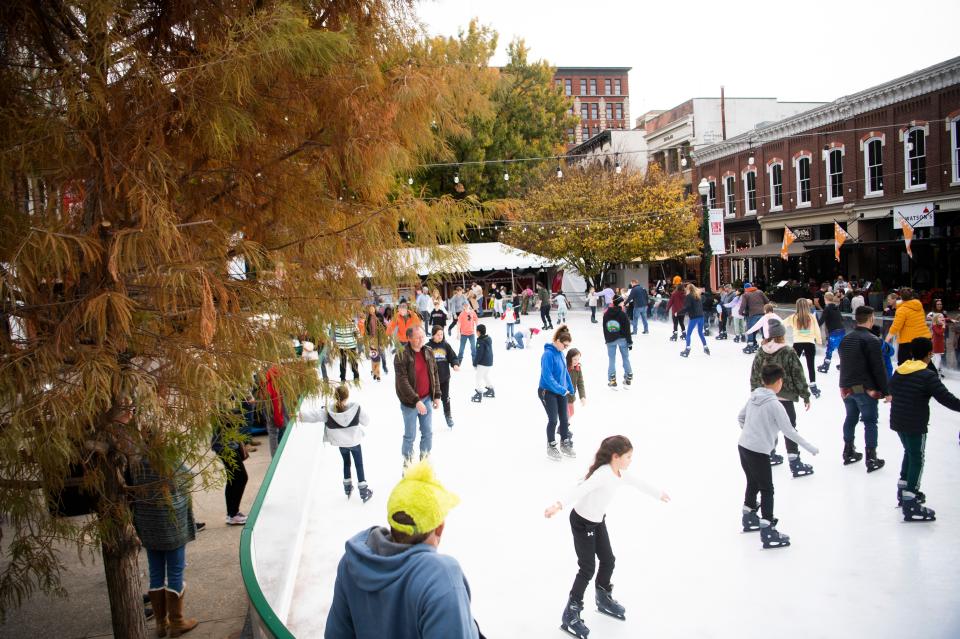 People take to the ice at the ice skating rink in Market Square, Saturday, Nov. 26, 2022.