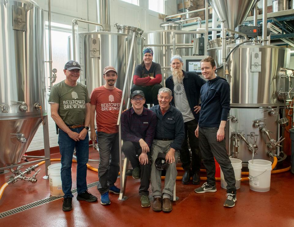 The Father's Day brew crew at Bell Tower Brewing Co. in Kent includes, from left, Mike Adams, Benjamin Tipton, Jennifer Hermann, Karl Walter and Seth Tipton. Sitting in front, Ryan Tipton and Chuck Tipton.
