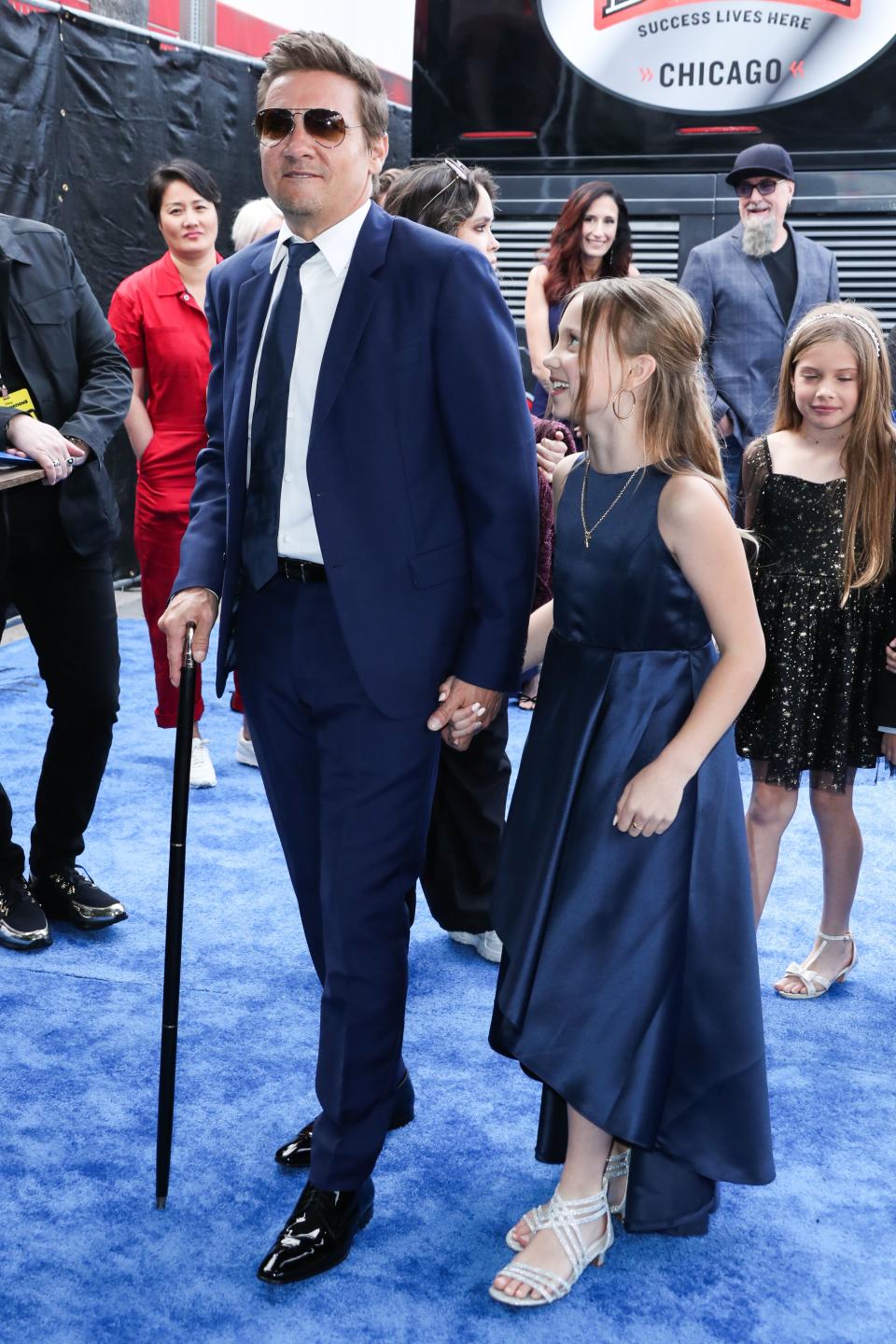 Jeremy Renner Walks Red Carpet With Daughter Ava After Accident: Photo