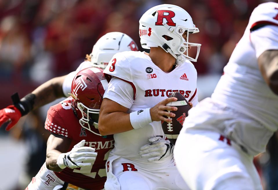 Sep 17, 2022; Philadelphia, Pennsylvania, USA; Temple Owls linebacker Layton Jordan (13) sacks Rutgers Scarlet Knights quarterback Evan Simon (3) in the first half at Lincoln Financial Field. Mandatory Credit: Kyle Ross-USA TODAY Sports