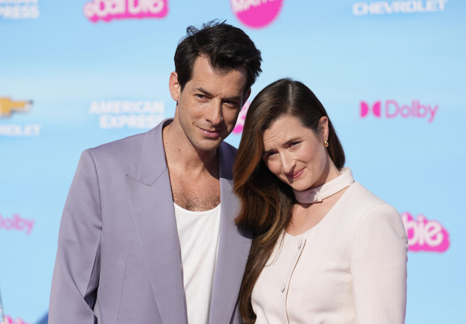 Mark Ronson, left, and Grace Gummer arrive at the premiere of "Barbie" on Sunday, July 9, 2023, at The Shrine Auditorium in Los Angeles. (AP Photo/Chris Pizzello)