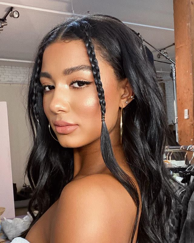 <p>The perfect low-effort hairstyle that looks anything but, this winter 2020 trend only requires two small braids on either side of your part (and maybe a <strong>quick blast of <a href="https://www.cosmopolitan.com/style-beauty/beauty/g28253173/texturizing-sprays/" rel="nofollow noopener" target="_blank" data-ylk="slk:texturizing spray;elm:context_link;itc:0;sec:content-canvas" class="link ">texturizing spray</a> for grit and hold</strong>). It's basically like a throwback tendril hairstyle—but <em>better</em>.</p><p><a href="https://www.instagram.com/p/CGoVgDDHean/?utm_source=ig_embed&utm_campaign=loading" rel="nofollow noopener" target="_blank" data-ylk="slk:See the original post on Instagram;elm:context_link;itc:0;sec:content-canvas" class="link ">See the original post on Instagram</a></p>