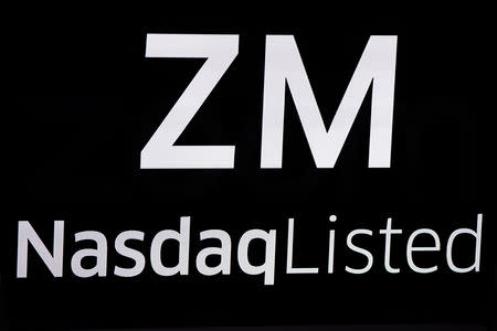 The Zoom Video Communications ticker symbol is pictured at the NASDAQ MarketSite in New York, New York, U.S., April 18, 2019. REUTERS/Carlo Allegri