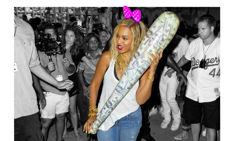 Beyoncé wears Minnie Mouse ears while carrying a bat made adorned with $100 bills. 