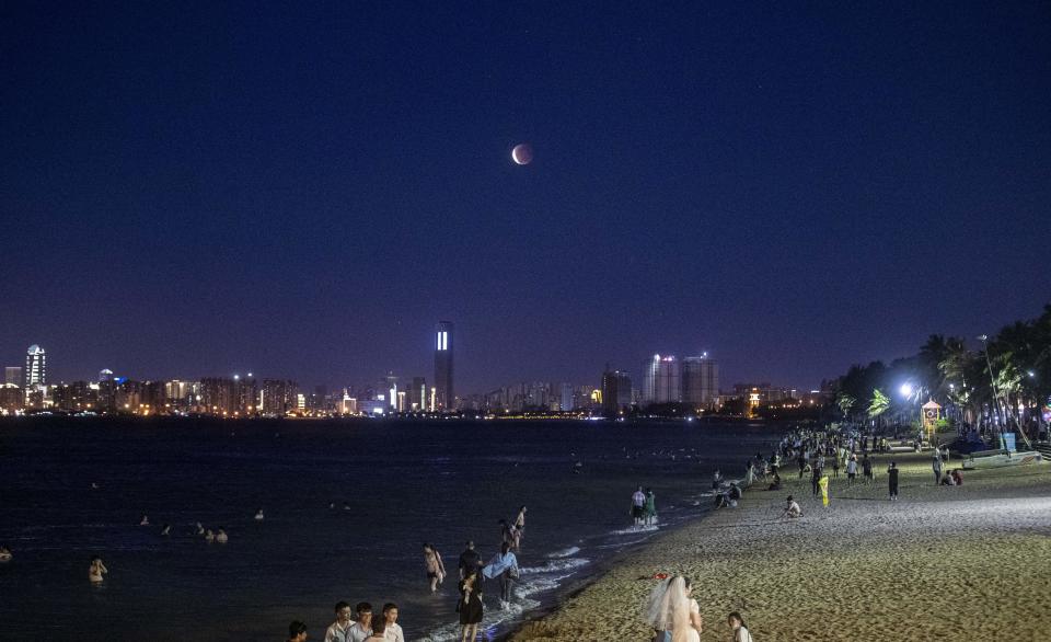 A total lunar eclipse occurs in the night sky of Haikou, the capital of southwest China's Hainan Province, on May 26, 2021. / Credit: Costfoto/Barcroft Media via Getty Images