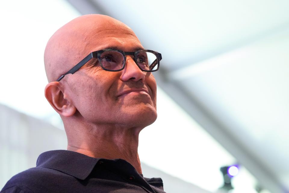 Microsoft CEO Satya Nadella watches the presentation during a showcase event of the company's AI assistant, Copilot, ahead of the annual Build developer conference at Microsoft headquarters, Monday, May 20, 2024, in Redmond, Wash. (AP Photo/Lindsey Wasson)