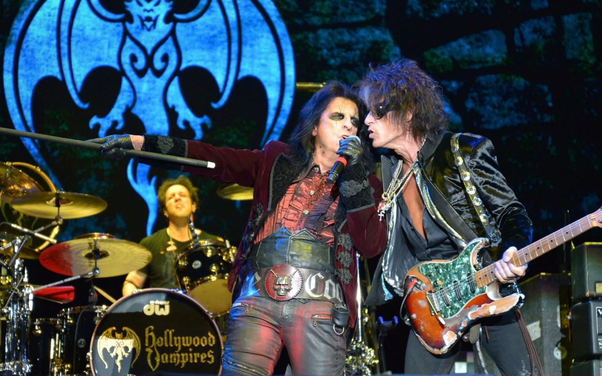 Alice Cooper and Joe Perry perform together - Getty Images Europe