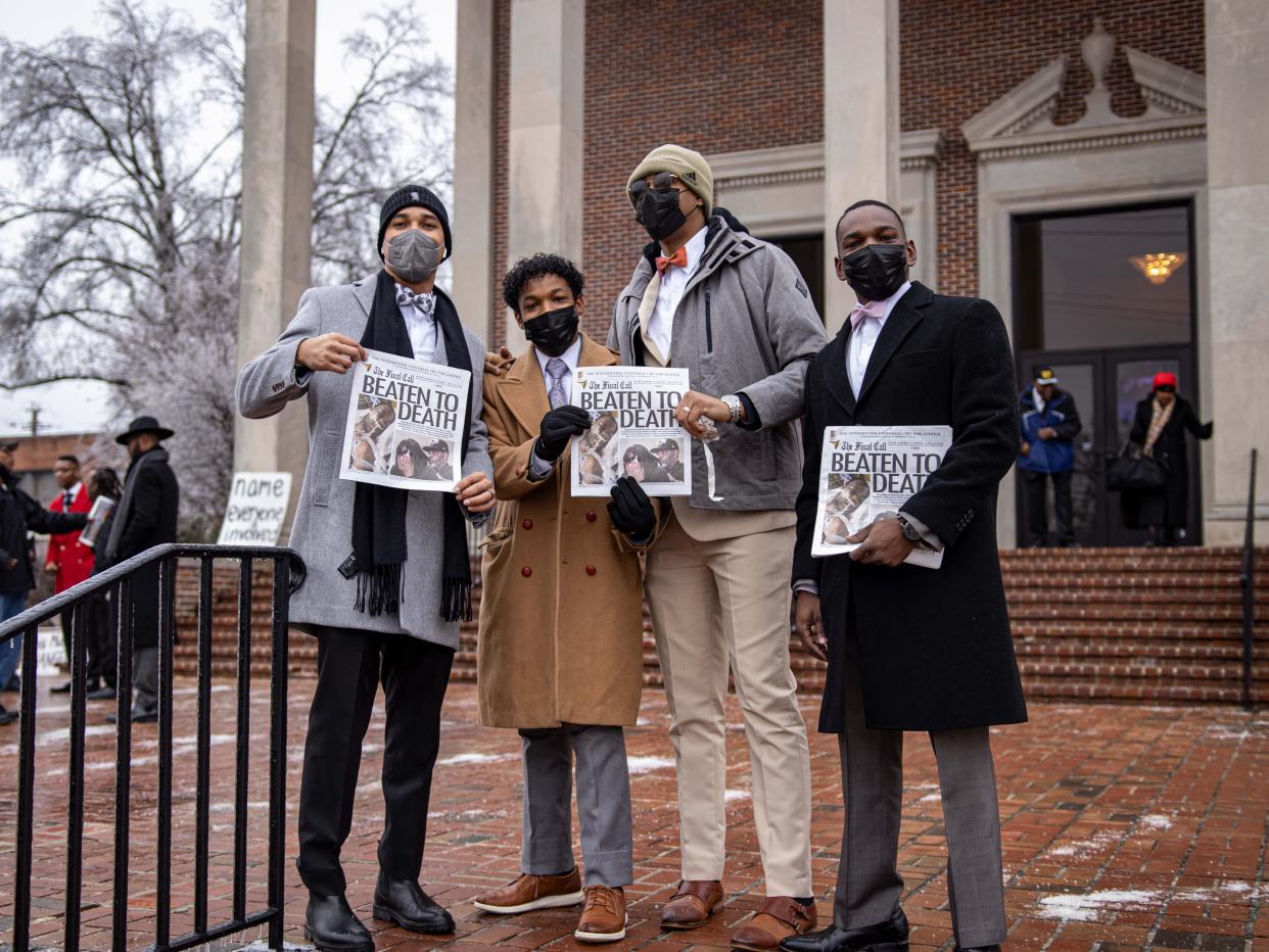 Funeral attendees stand outside the Memphis church where Tyre Nichols' memorial service was held on Wednesday.