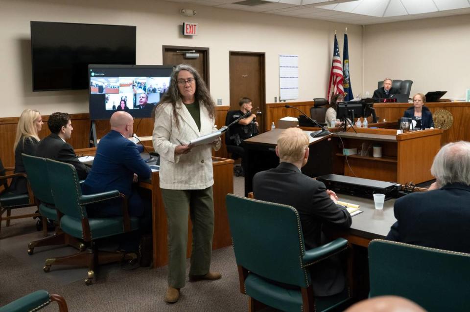 Wendy Olson, center, an attorney representing a coalition of media outlets, including the Idaho Statesman, wraps up arguments at a hearing Sept. 13 in Latah County District Court in Moscow. She asked that Judge John Judge continue to allow cameras in the courtroom in the trial of Bryan Kohberger, second from left, who is accused of killing four University of Idaho students in November 2022.