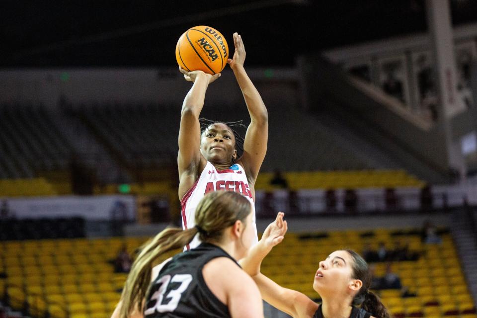 NMSU guard Molly Kaiser shoots a basket during a college basketball game on Saturday, Feb. 18, 2023, at the Pan American Center