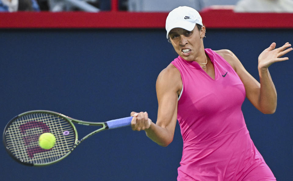 Madison Keys, of the United States, plays a shot during her women's first-round match against Venus Williams, also of the United States, at the National Bank Open tennis tournament in Montreal, Monday, Aug. 7, 2023. (Graham Hughes/The Canadian Press via AP)