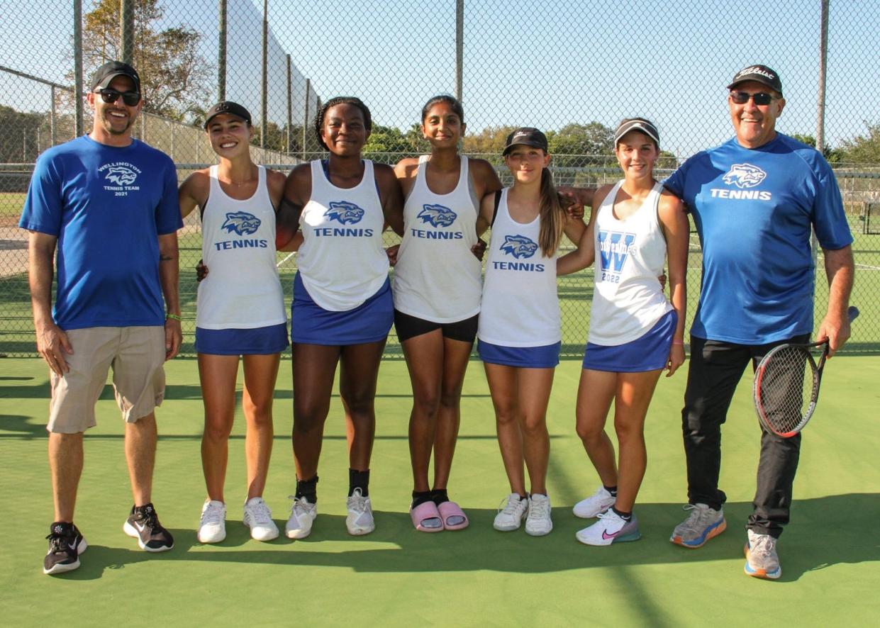 From left: Wellington tennis coach Josh Mcelwain, Jayden Jaraczewski, Keira Uter, Laasya Movva, Raya Dittfurth, Scarlett Stephens, coach Pete Lang.