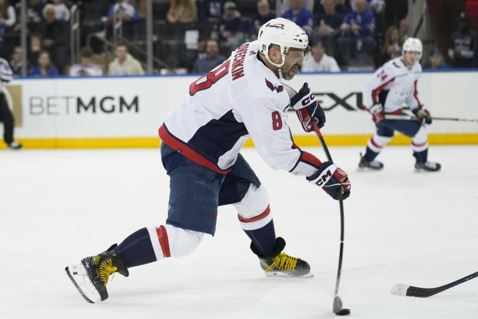 Washington Capitals' Alex Ovechkin shoots during the second period in Game 1 of an NHL hockey Stanley Cup first-round playoff series against the New York Rangers, Sunday, April 21, 2024, in New York. (AP Photo/Seth Wenig)
