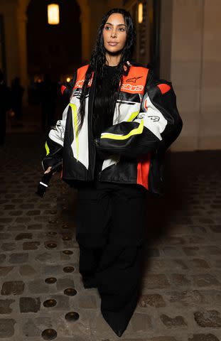 <p>ODA/SplashNews</p> Kim Kardashian leaving the Victoria Beckham after party wearing a full Balenciaga outfit