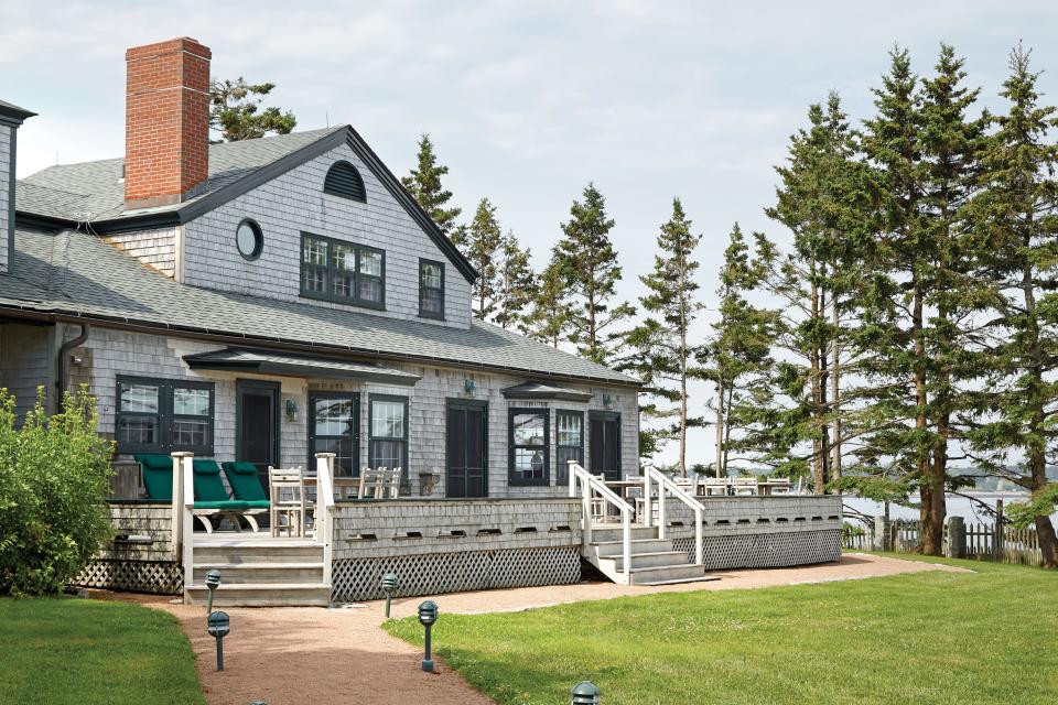 <p>"We can't possibly go look at that house. We'll buy it." That's what Kathleen McIntyre and her husband, Duncan, told one another when a historic property on Maine's Great Cranberry Island hit the market. The McIntyres, who reside just outside of Boston, had long had a soft spot for the rugged shores surrounding Bar Harbor and Mt. Desert Island, and they'd dreamed of owning a summer home there.</p> <p><i>Pictured: Original details, including the cedar shingles, exude classic New England charm.</i></p>