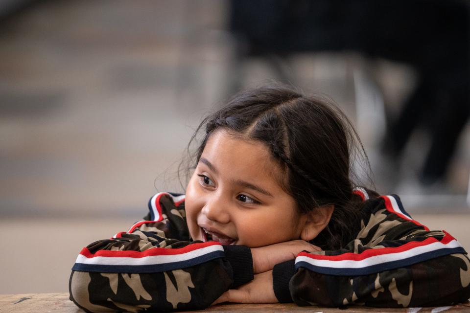 Juliette M., 7, participates in a reading activity during an after school program at the Boys & Girls Clubs of the Valley Grant Woods Branch in Mesa on November 14, 2023.