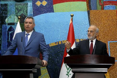 Iraq's Foreign Minister Ibrahim al-Jaafari (R) speaks during a news conference with Russia's Deputy Prime Minister Dmitry Rogozin in Baghdad, Iraq February 11, 2016. REUTERS/Khalid al Mousily