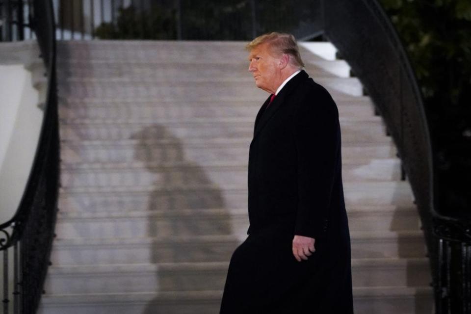 U.S. President Donald Trump walks to the White House residence after exiting Marine One upon his return on January 12, 2021 in Washington, DC. Following last week’s deadly pro-Trump riot on Capitol Hill, Trump traveled to the border town of Alamo, Texas to view the partial construction of wall along the U.S.-Mexico border. (Photo by Drew Angerer/Getty Images)