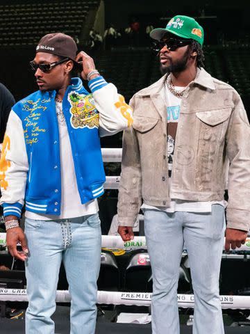 <p>Cassy Athena/Getty</p> Stefon Diggs and Trevon Diggs after the WBA World Lightweight Championship on May 28, 2022 in New York City.