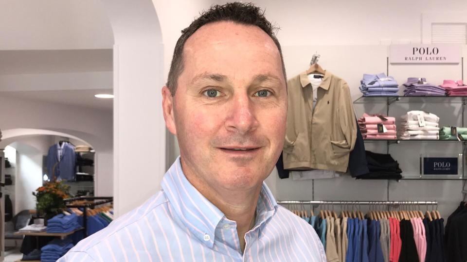 Paul McCartan in his refurbished clothes shop