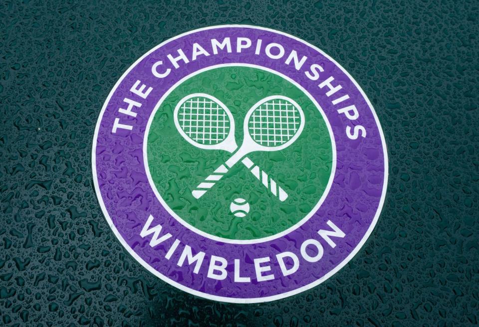 A picture shows the Wimbledon logo at the All England Lawn Tennis Club in west London on June 27, 2020 the weekend before the Wimbledon Championships tennis tournament were due to start on June 29. - There was none of the usual bustle of preparations the Saturday before the top tennis stars would normally decend on Wimbledon for The Championships at the All England Lawn Tennis Club. The Championships, which were due to start on June 29, have been cancelled due to the coronavirus pandemic. - RESTRICTED TO EDITORIAL USE (Photo by Bob MARTIN / AELTC / AFP) / RESTRICTED TO EDITORIAL USE (Photo by BOB MARTIN/AELTC/AFP via Getty Images)