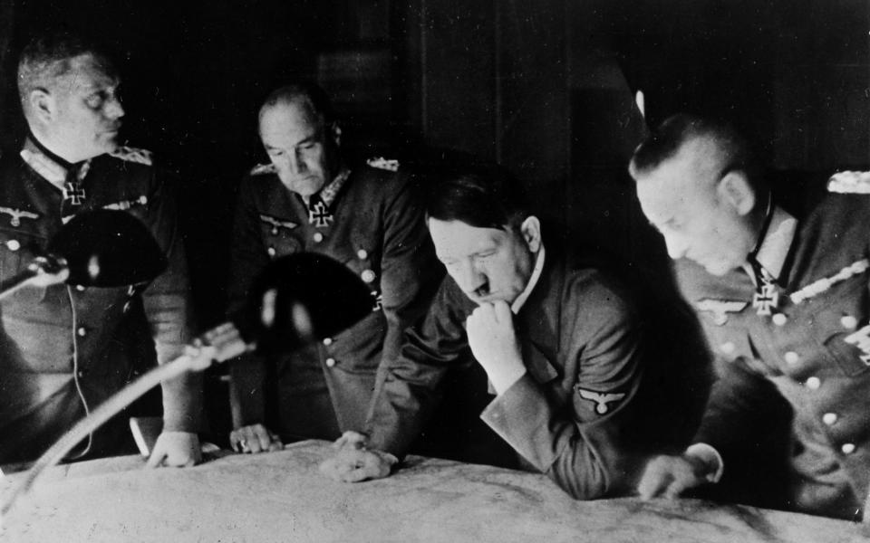 Adolf Hitler studies plans for the invasion of the USSR in 1942