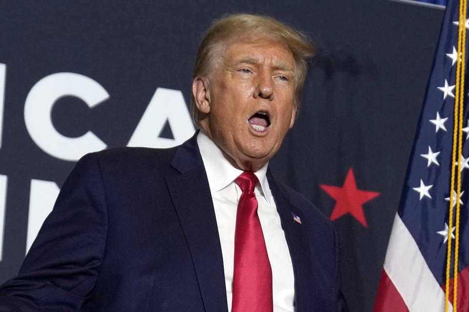 FILE — Former President Donald Trump speaks during a rally, Sept. 20, 2023, in Dubuque, Iowa. New York Judge Arthur Engoron, ruling in a civil lawsuit brought by New York Attorney General Letitia James, found that Trump and his company deceived banks, insurers and others by massively overvaluing his assets and exaggerating his net worth on paperwork used in making deals and securing loans. (AP Photo/Charlie Neibergall, File)