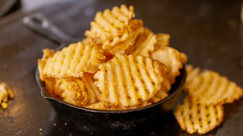 Waffle fries in small pan