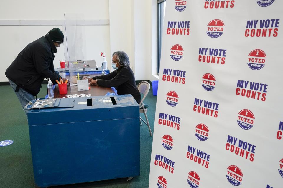 FILE - Andre Childs casts his ballot at a polling station Thursday, Feb. 9, 2023, in Milwaukee. (AP Photo/Morry Gash, file)