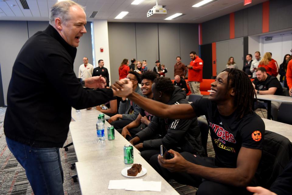 Rutgers Scarlet Knights men's basketball Head Coach Steve Pikiell celebrates with Cliff Omoruyi on Selection Sunday as they are announced the 11th seed in the west region of the NCAA Tournament. The team watches selection Sunday at the Gary and Barbara Rodkin Academic Success Center on March 13, 2022.