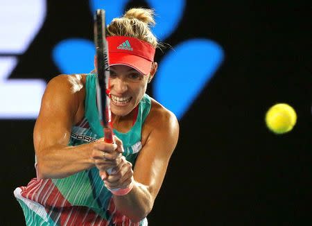 Germany's Angelique Kerber hits a shot during her final match against Serena Williams of the U.S. at the Australian Open tennis tournament at Melbourne Park, Australia, January 30, 2016. REUTERS/Tyrone Siu