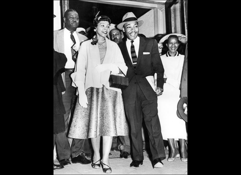 Martin Luther King, 27, and his wife, Coretta Scott King, emerge 23 March 1956 from Montgomery Court House, following his trial on charges of conspiring to boycott segregated city buses.