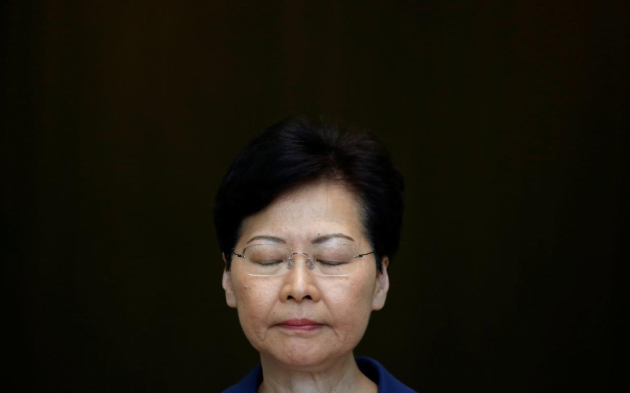 Carrie Lam defended the conduct of police in 'extremely difficult circumstances' - REUTERS