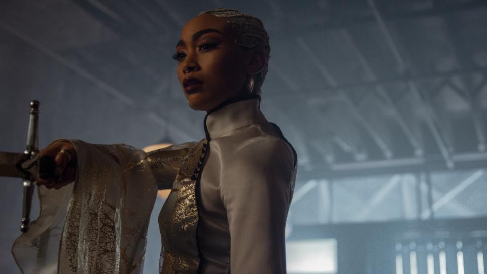 photo of Tati Gabrielle as Prudence Blackwood holding a sword