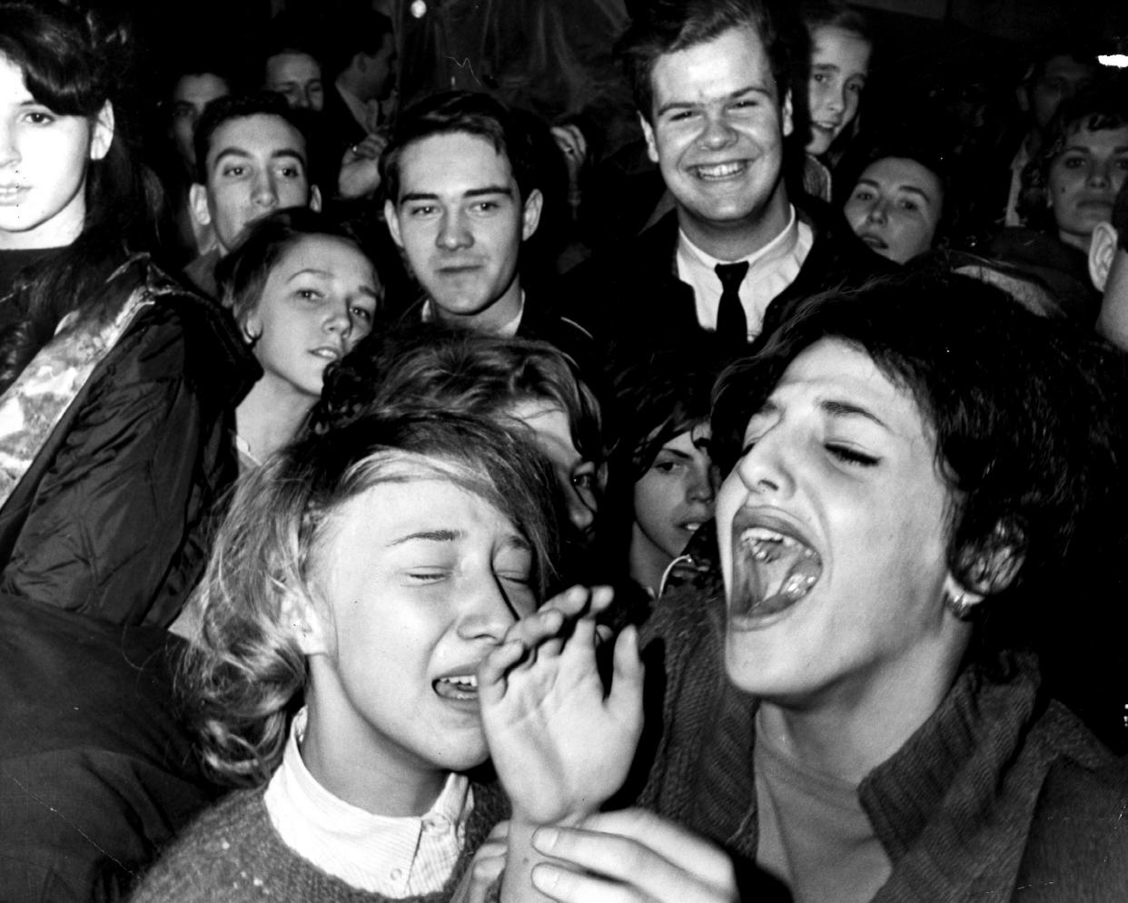 Screaming Beatles fans at JFK