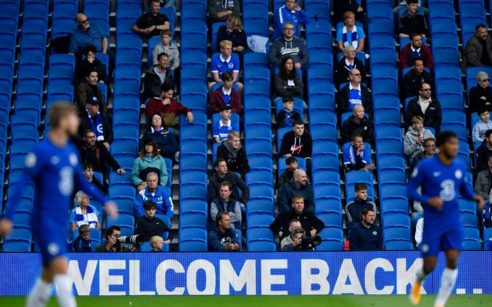 Soccer Football - Pre Season Friendly - Brighton & Hove Albion v Chelsea - The American Express Community Stadium, Brighton, Britain - August 29, 2020 Brighton fans inside the stadium during the match, as fans are allowed into a stadium following the outbreak of the coronavirus disease - Reuters /TOBY MELVILLE 