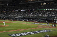 Los Angeles Dodgers starting pitcher Clayton Kershaw throws to Tampa Bay Rays' Joey Wendle during the second inning in Game 1 of the baseball World Series Tuesday, Oct. 20, 2020, in Arlington, Texas. (AP Photo/Tony Gutierrez)